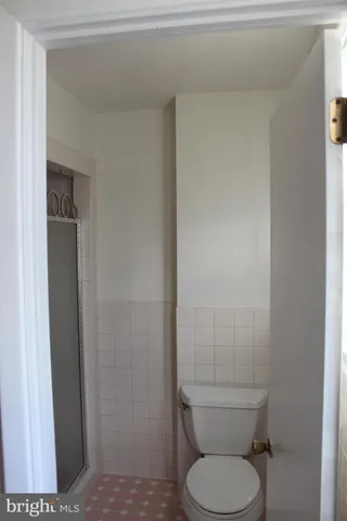 a bathroom with a toilet