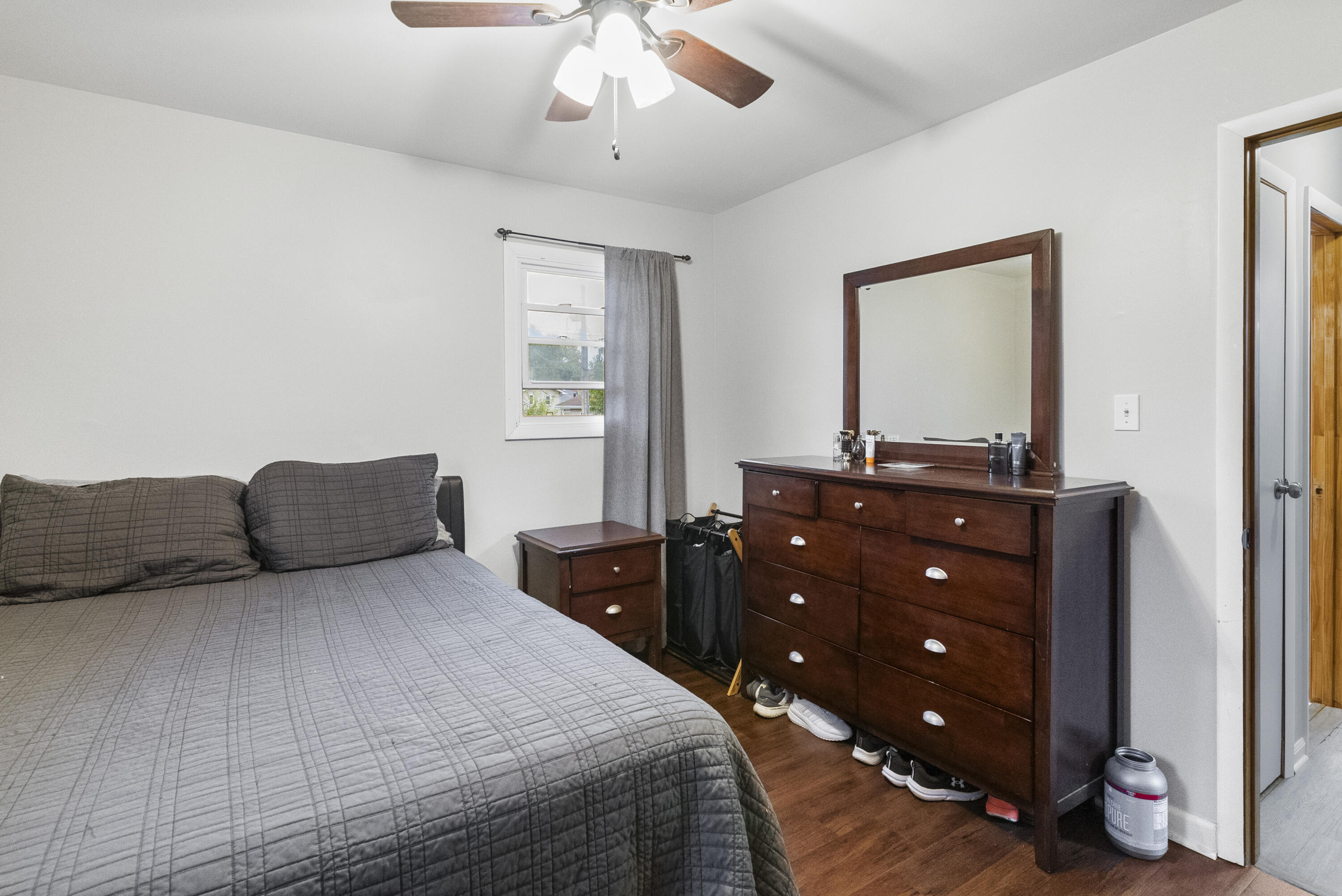 9331 Farmer Drive Highland, IN 46322 - Photo 11 of 19 a bedroom with a bed and a dresser