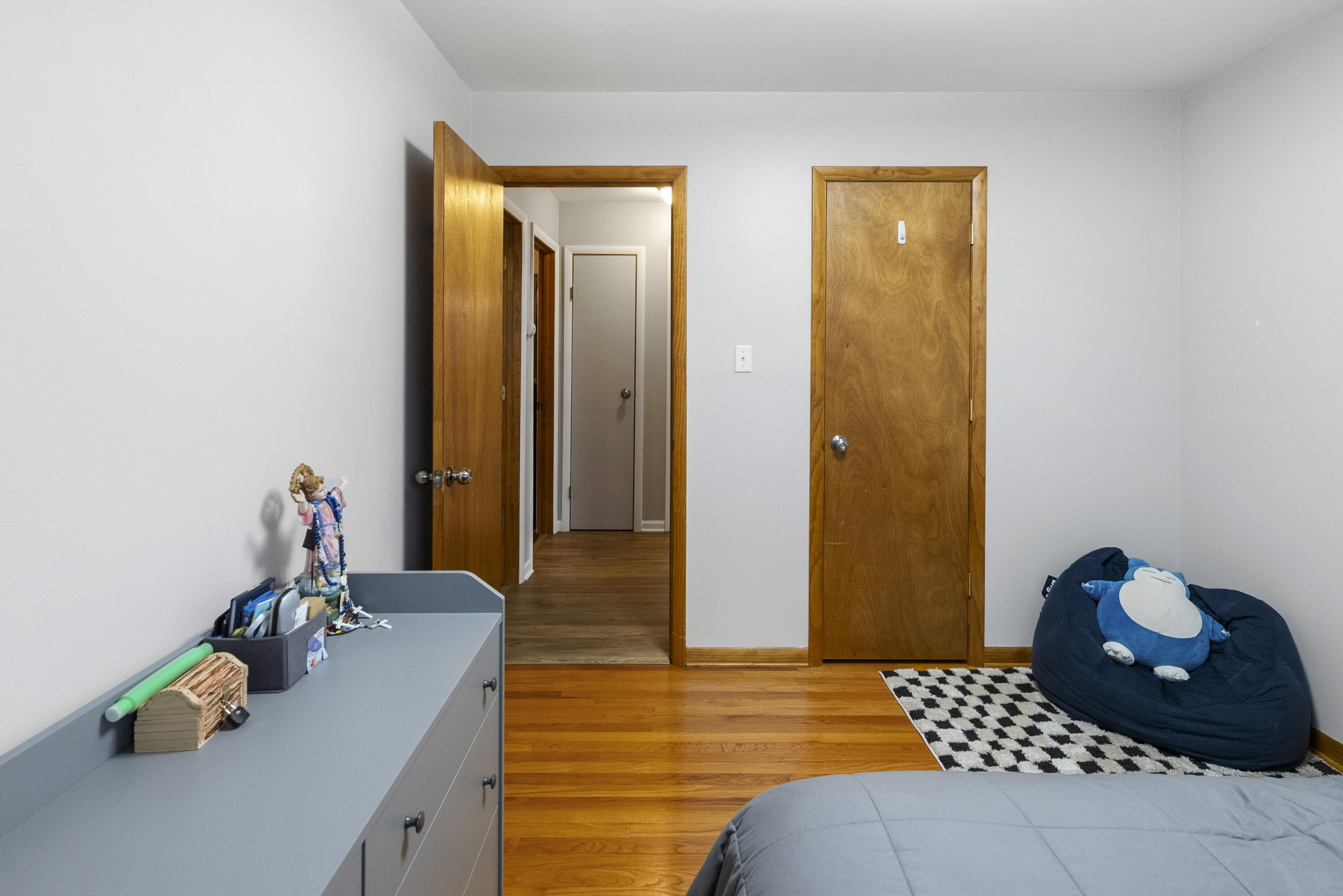 9331 Farmer Drive Highland, IN 46322 - Photo 13 of 19 a bedroom with a bed and a dresser