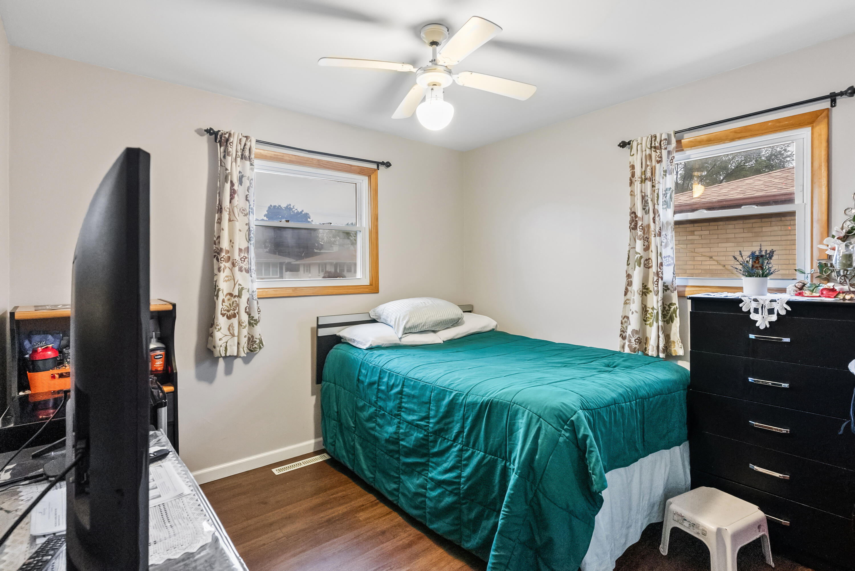 9331 Farmer Drive Highland, IN 46322 - Photo 14 of 19 a bedroom with a bed and a mirror