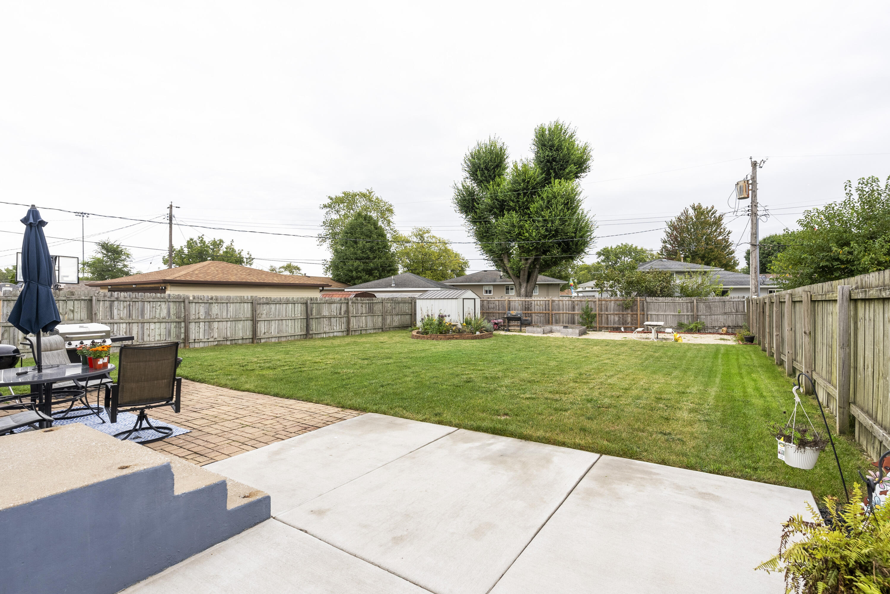 9331 Farmer Drive Highland, IN 46322 - Photo 19 of 19 a view of a backyard with sitting area