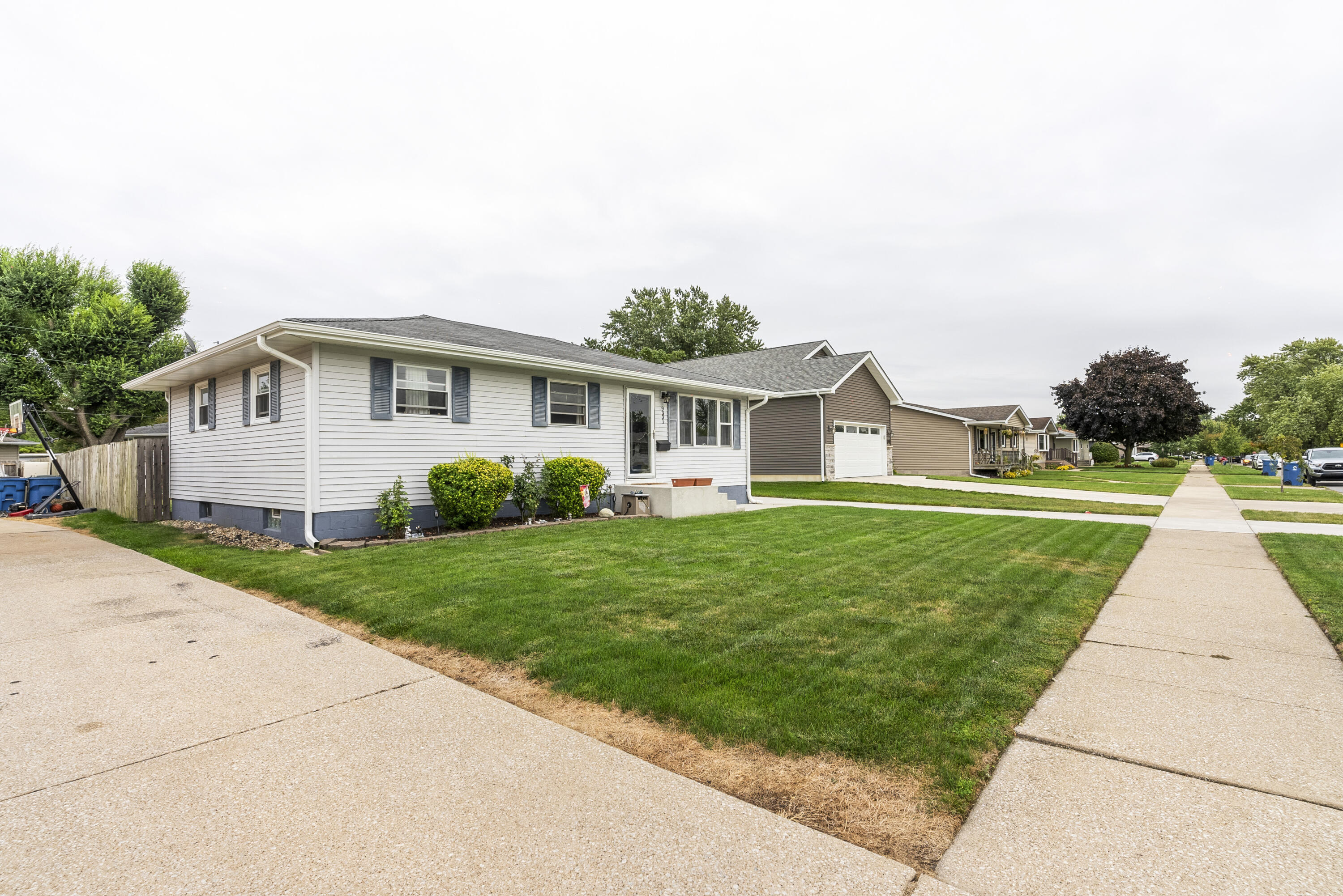 9331 Farmer Drive Highland, IN 46322 - Photo 2 of 19 a view of house with a yard