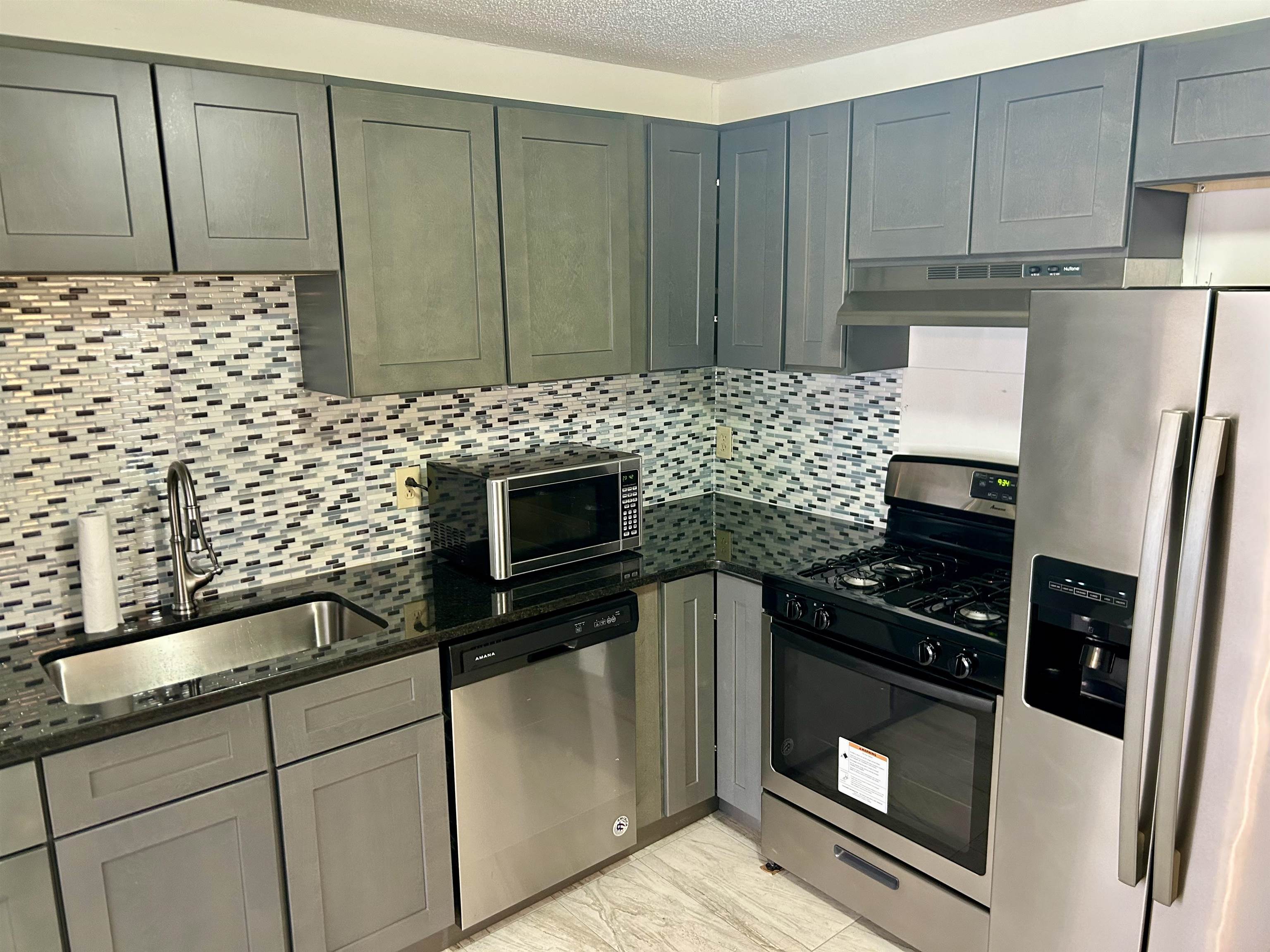 377 Huse Road, Unit # 33 Manchester, NH 03103 - Photo 17 of 22 Gallery Image 17