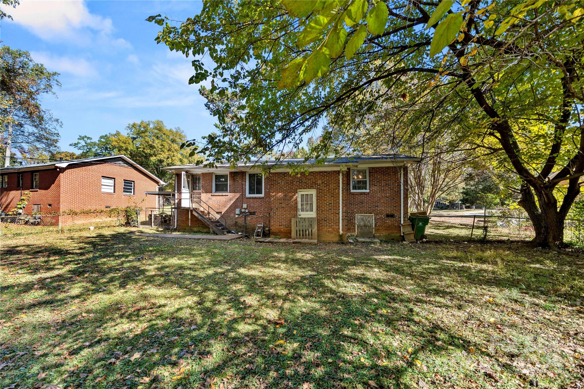 4838 Hidden Valley Road Charlotte, NC 28213 - Photo 22 of 22 a front view of house with yard and green space