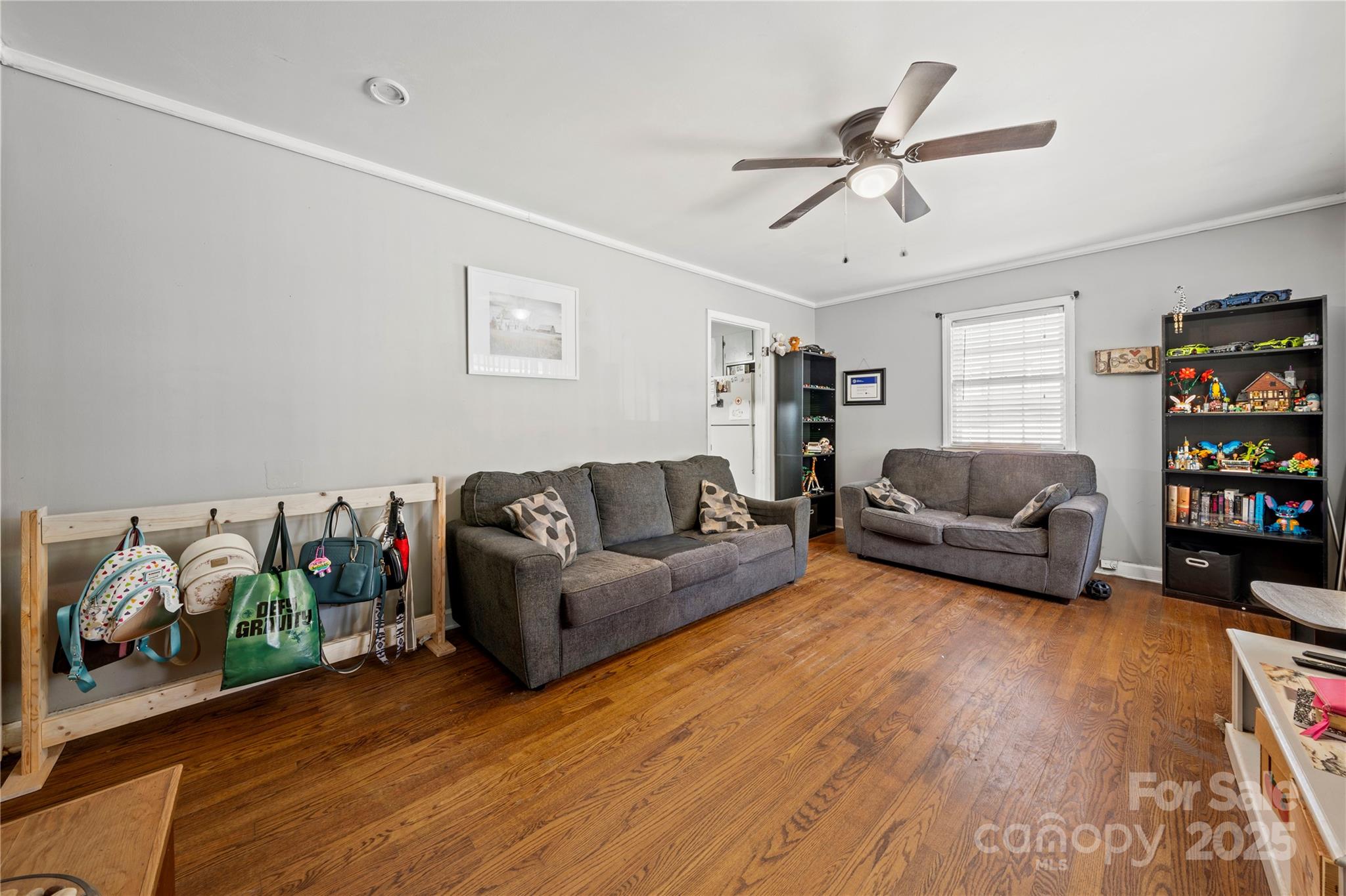 4838 Hidden Valley Road Charlotte, NC 28213 - Photo 6 of 22 a living room with furniture and a wooden floor