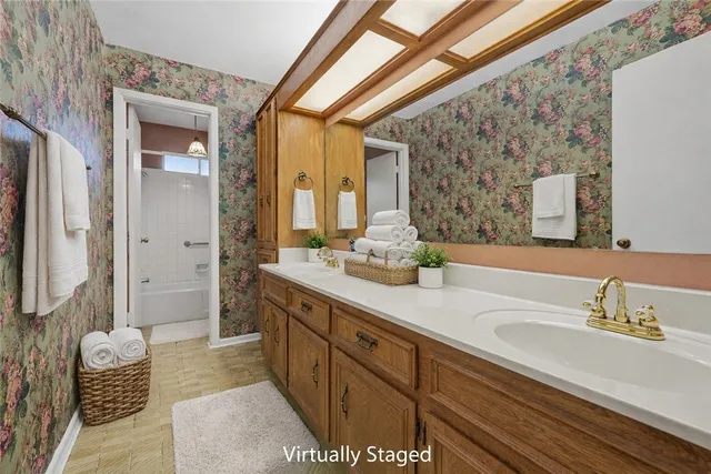 a bathroom with a toilet and a bathtub