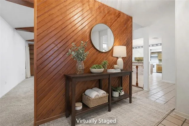 a view of an empty room with a fireplace