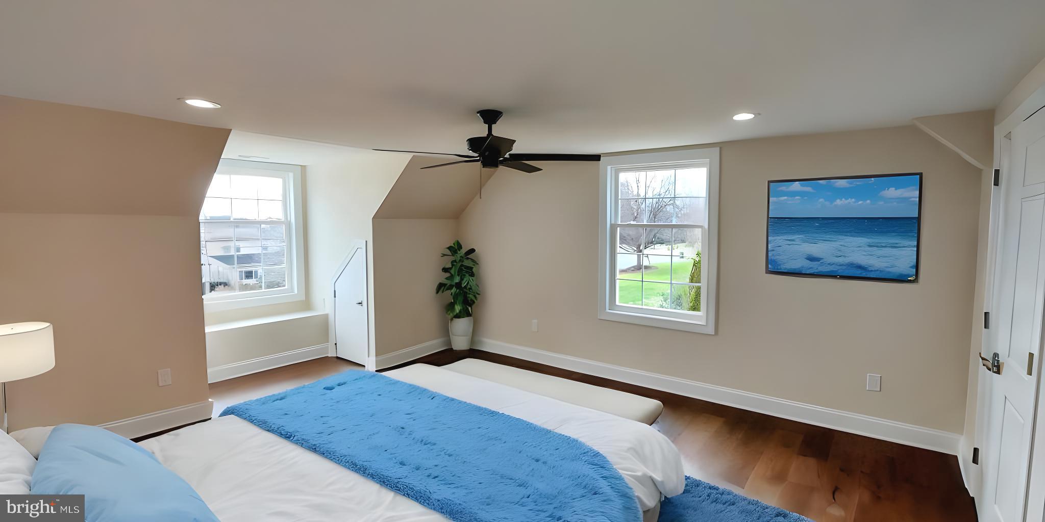 4909 Threadneedle Road Wilmington, DE 19807 - Photo 13 of 33 a view of an entryway with wooden floor and windows
