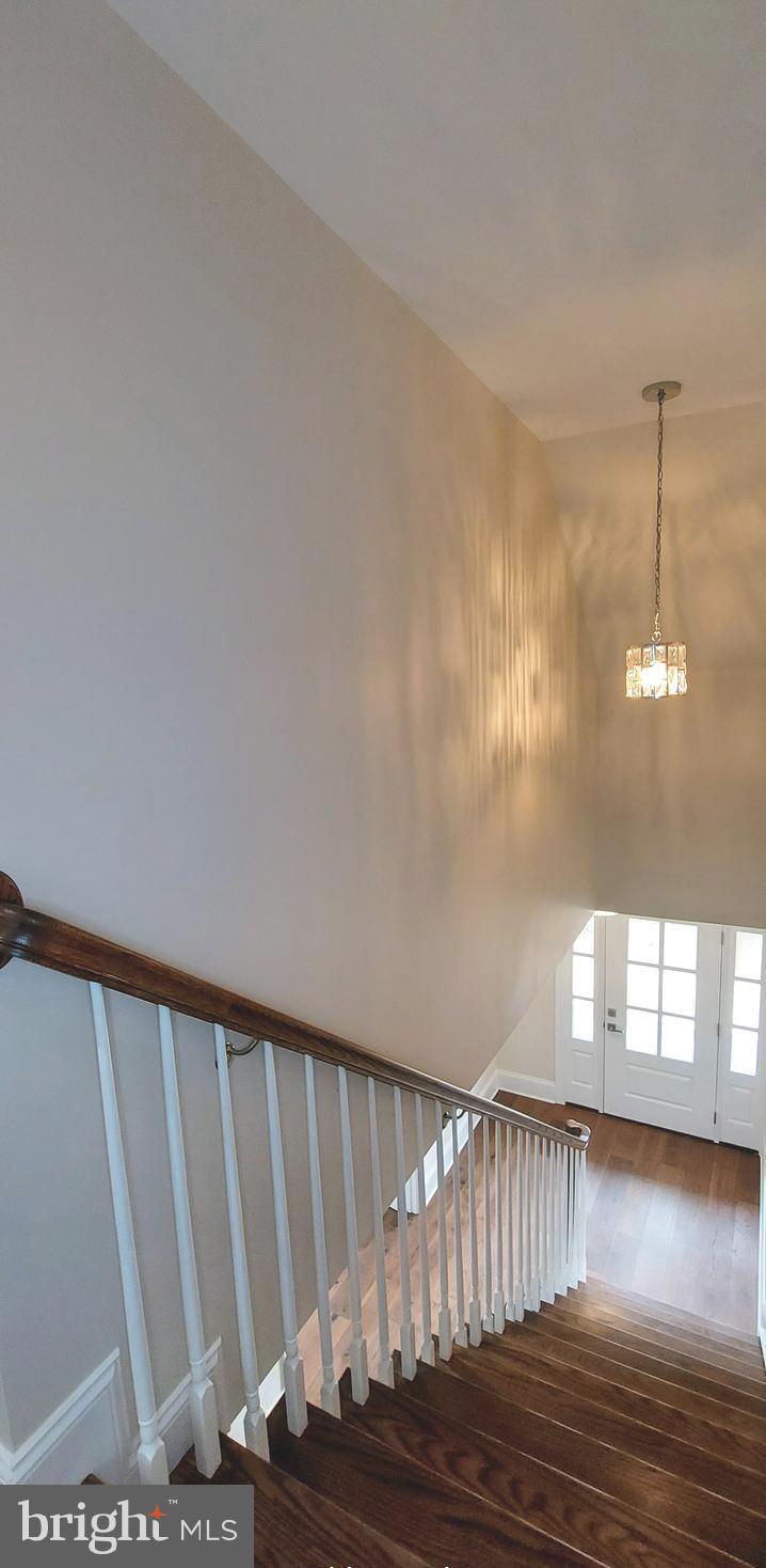 4909 Threadneedle Road Wilmington, DE 19807 - Photo 28 of 33 a view of empty room with wooden floor