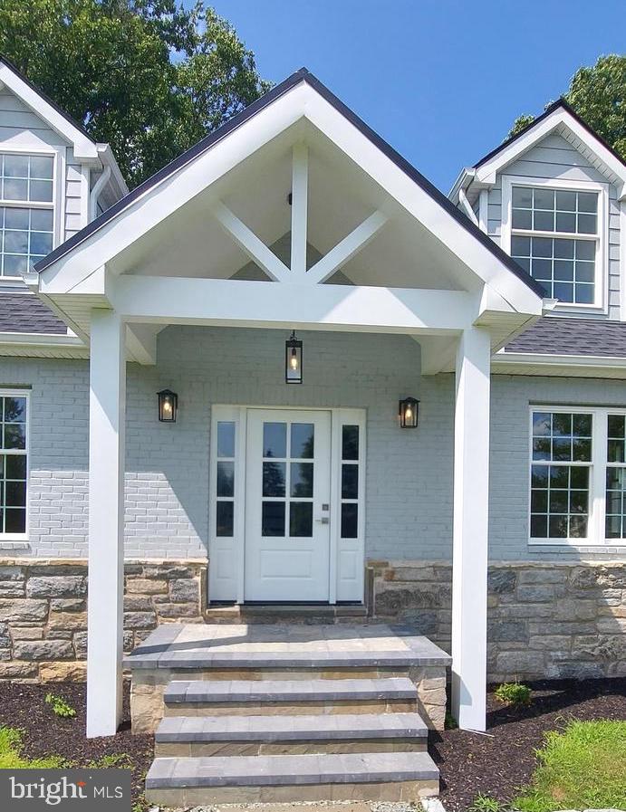 4909 Threadneedle Road Wilmington, DE 19807 - Photo 32 of 33 a front view of a house with a porch