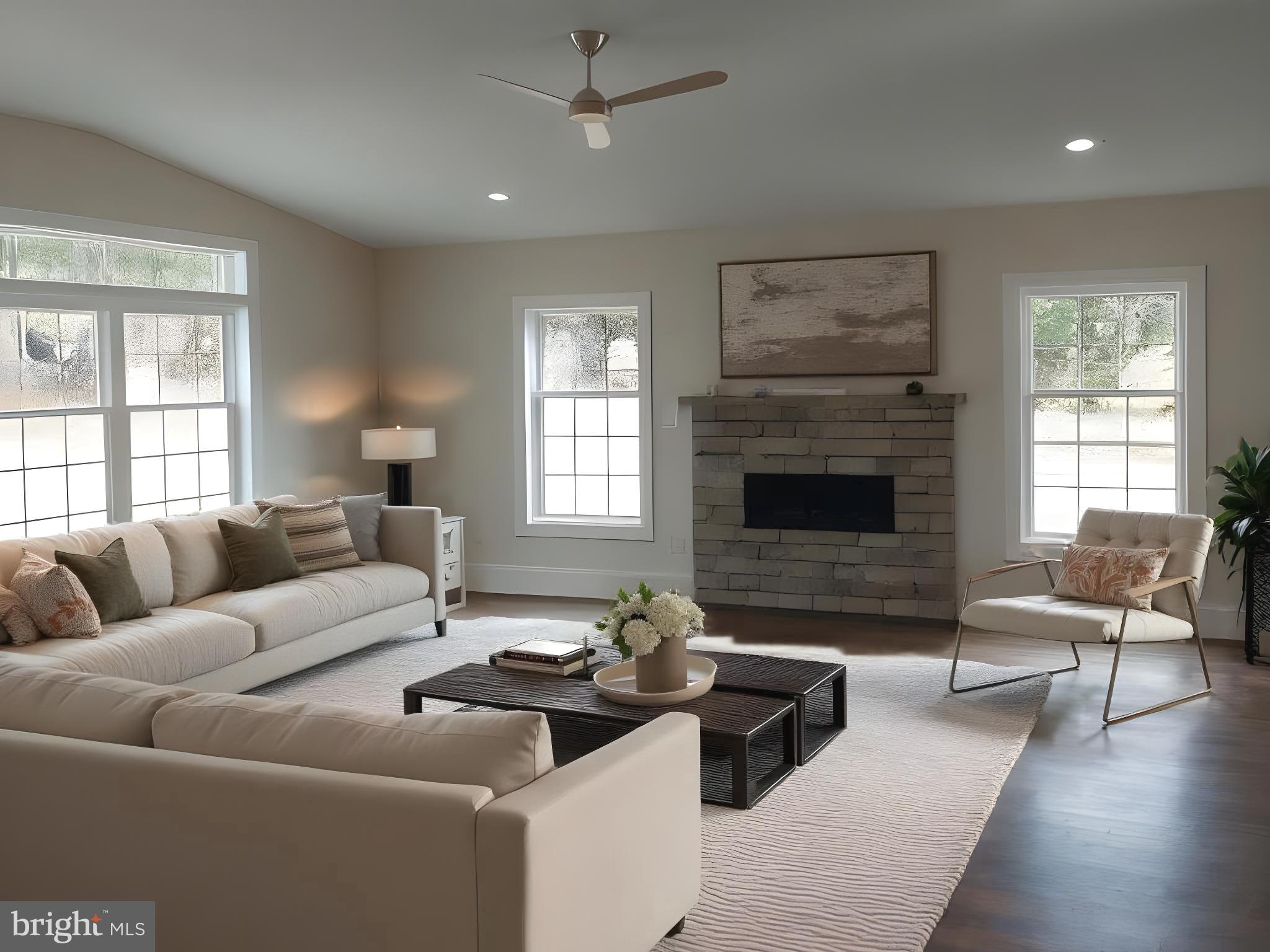 4909 Threadneedle Road Wilmington, DE 19807 - Photo 7 of 33 a living room with furniture and a fireplace
