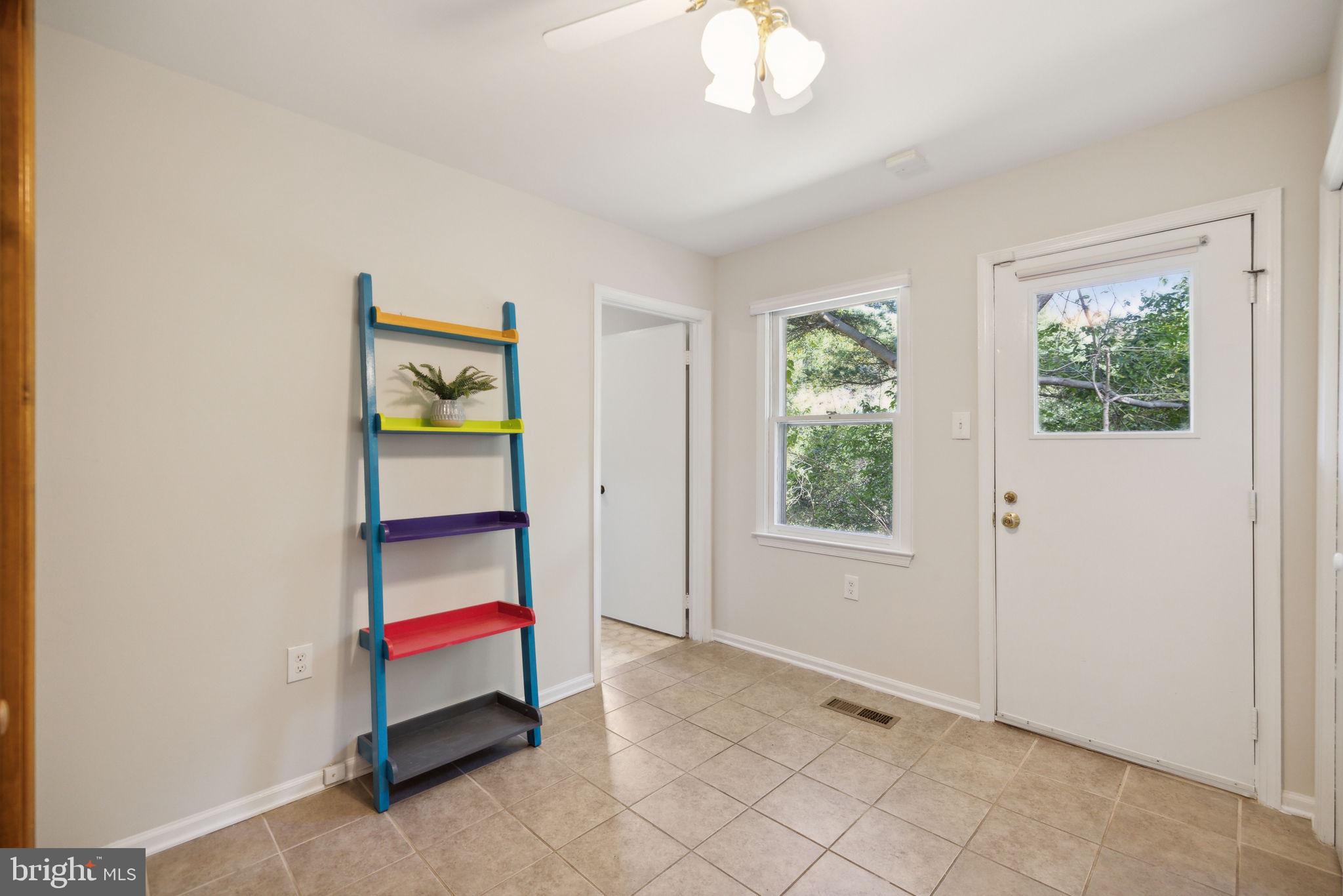 1729 Glastonberry Road Potomac, MD 20854 - Photo 14 of 32 Large Mudroom, walk out to deck