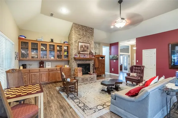 a room with furniture and a chandelier