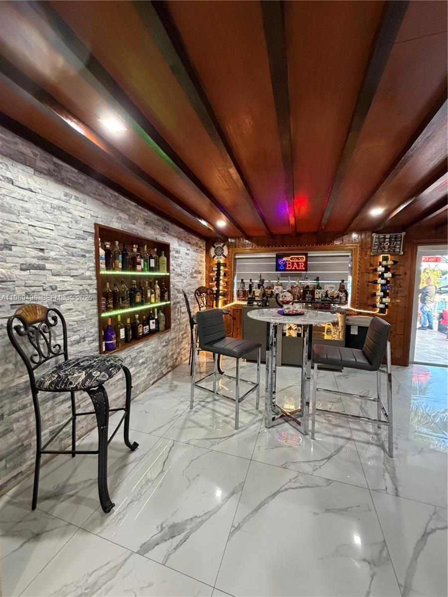 15022 Southwest 67th Lane Miami, FL 33193 - Photo 12 of 15 a view of a chairs and tables in a room