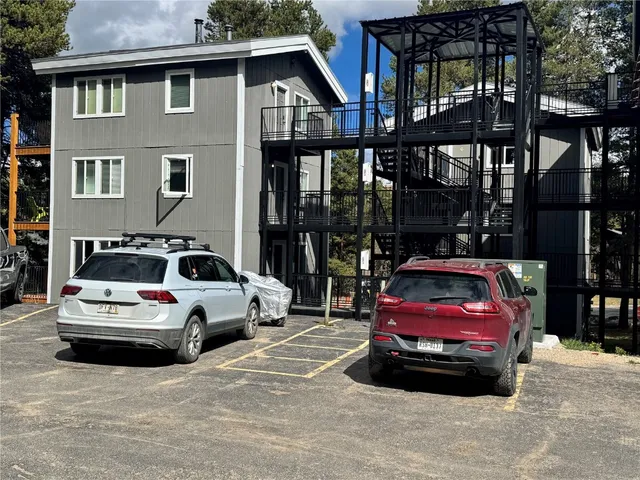 a car parked in front of a house