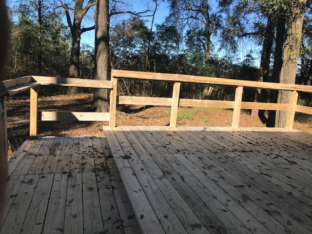 117 Beacons Bend Road Crestview, FL 32536 - Photo 3 of 30 a view of balcony with wooden floor and fence