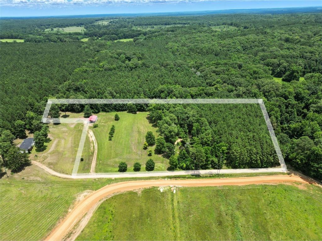 517 Sanders Road Minden, LA 71055 - Photo 2 of 12 a view of a swimming pool with a yard