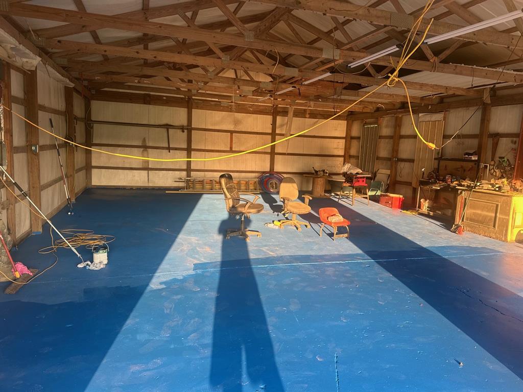 517 Sanders Road Minden, LA 71055 - Photo 8 of 12 a view of an empty room with wooden floor