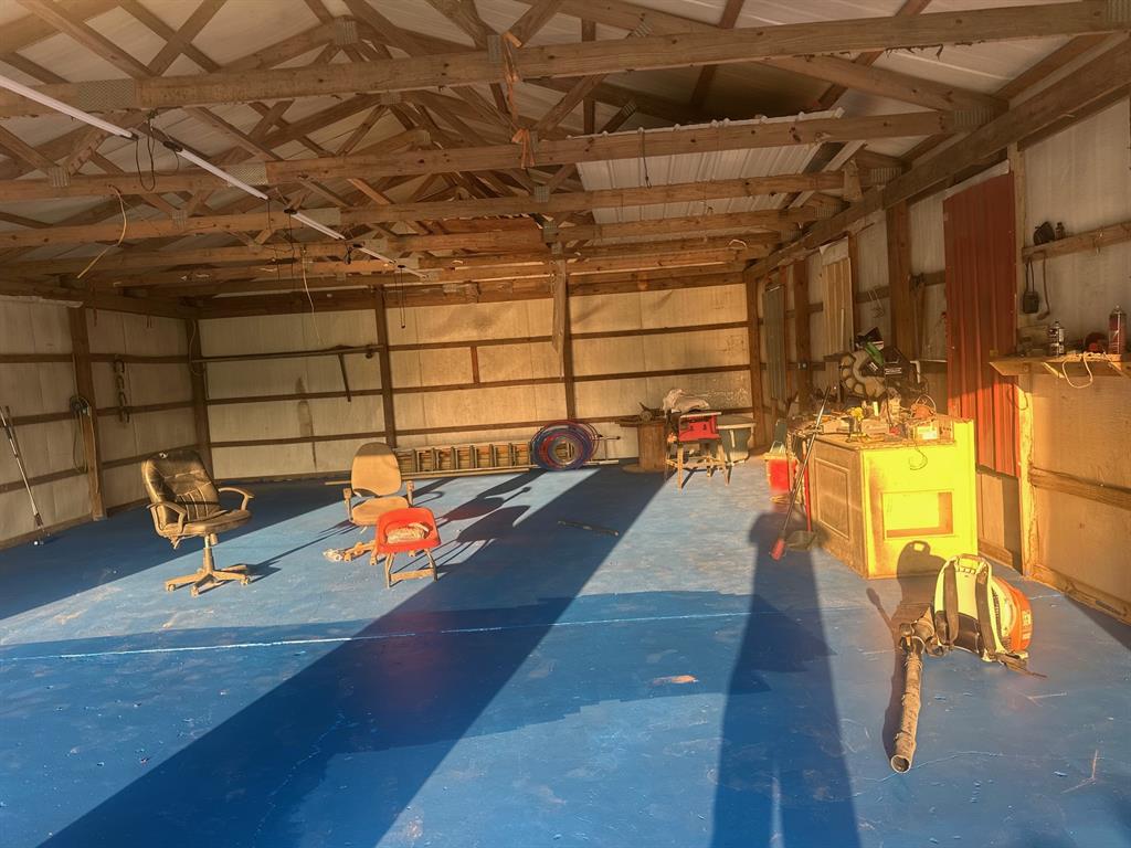 517 Sanders Road Minden, LA 71055 - Photo 10 of 12 a view of a patio with a table and chairs