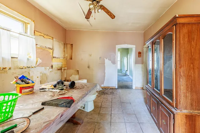 a view of a room with a large window