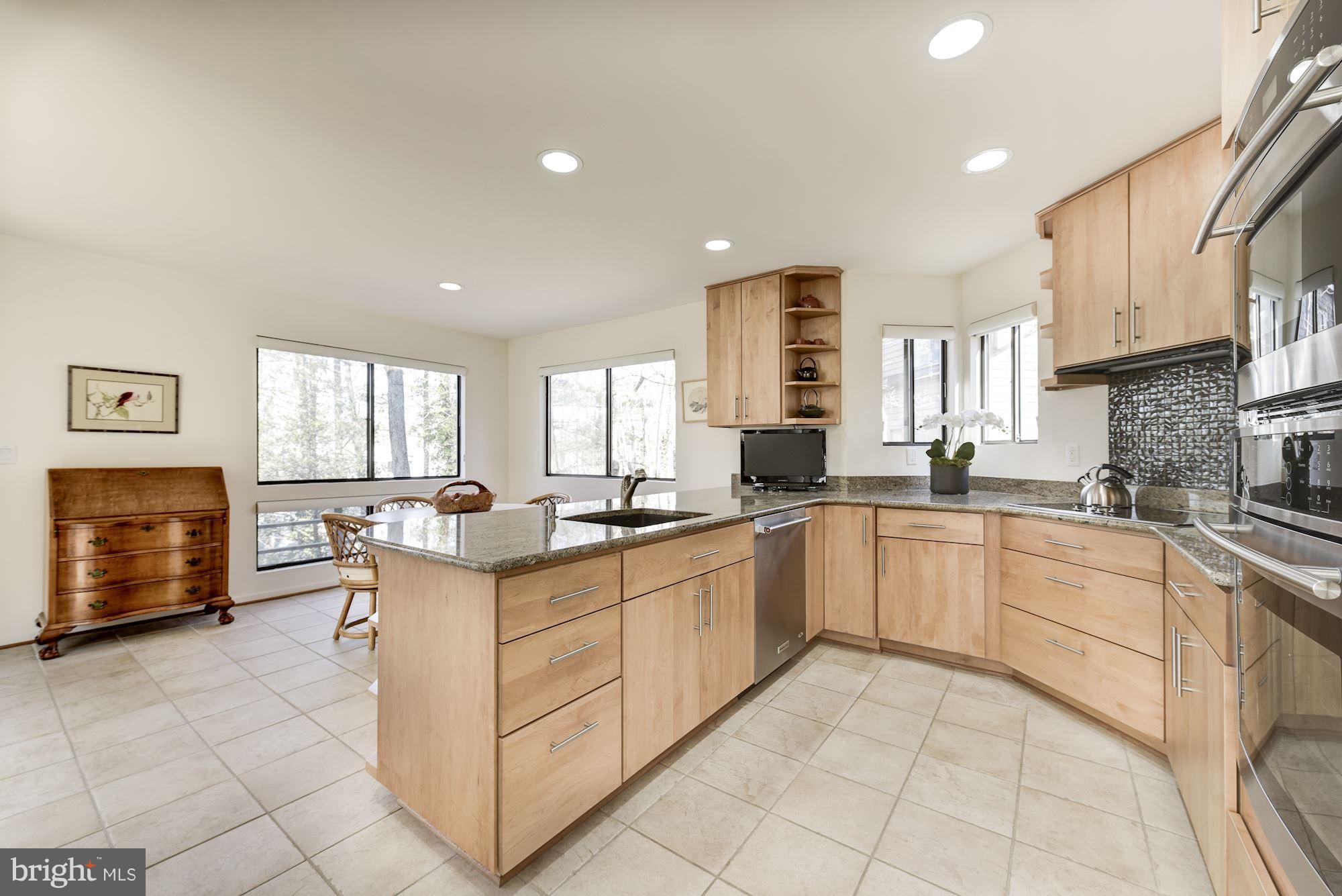 2263 Compass Point Lane Reston, VA 20191 - Photo 12 of 30 Kitchen w/ maple cabinets and granite counters