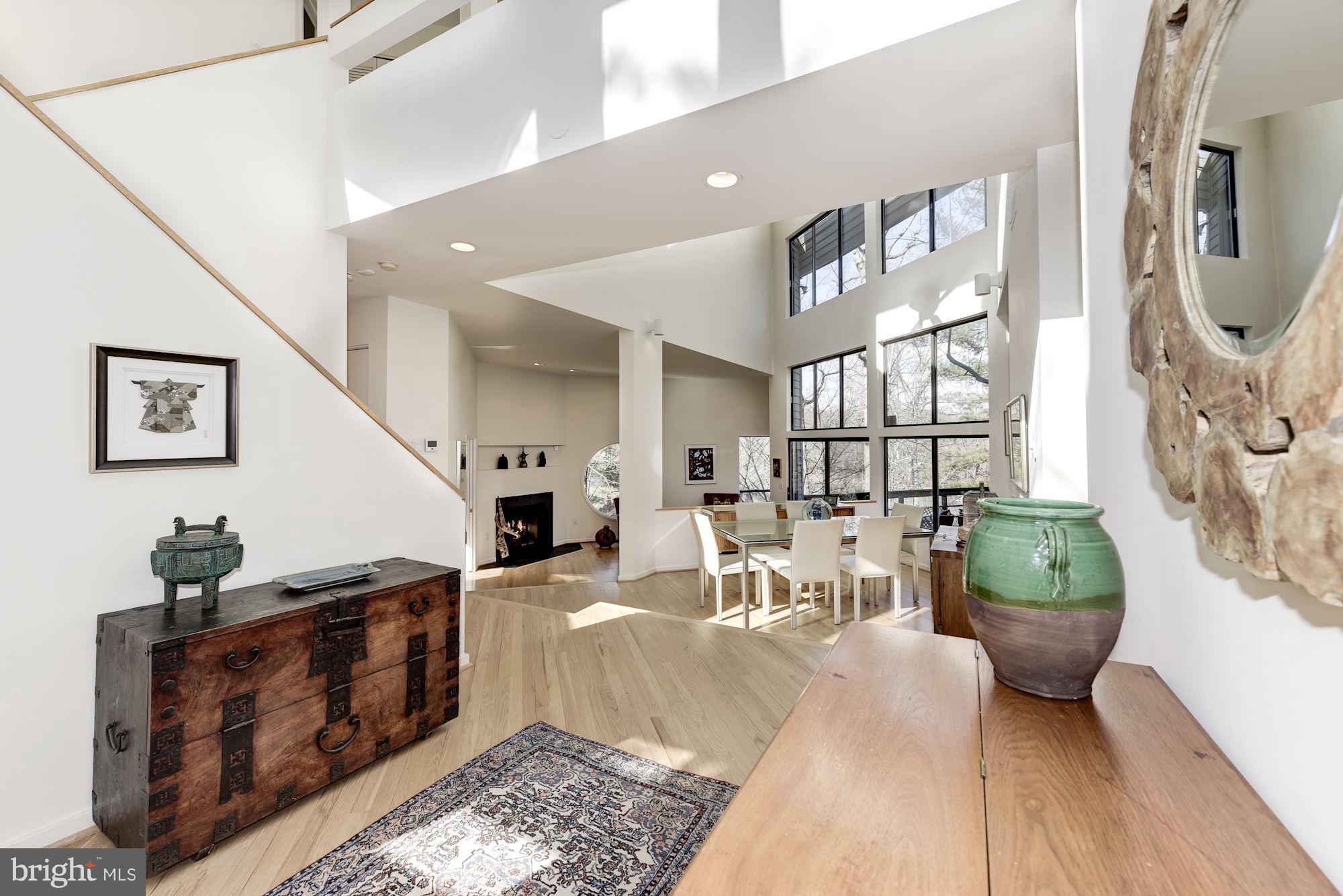 2263 Compass Point Lane Reston, VA 20191 - Photo 3 of 30 Incredible wall of windows fill the home w/ light