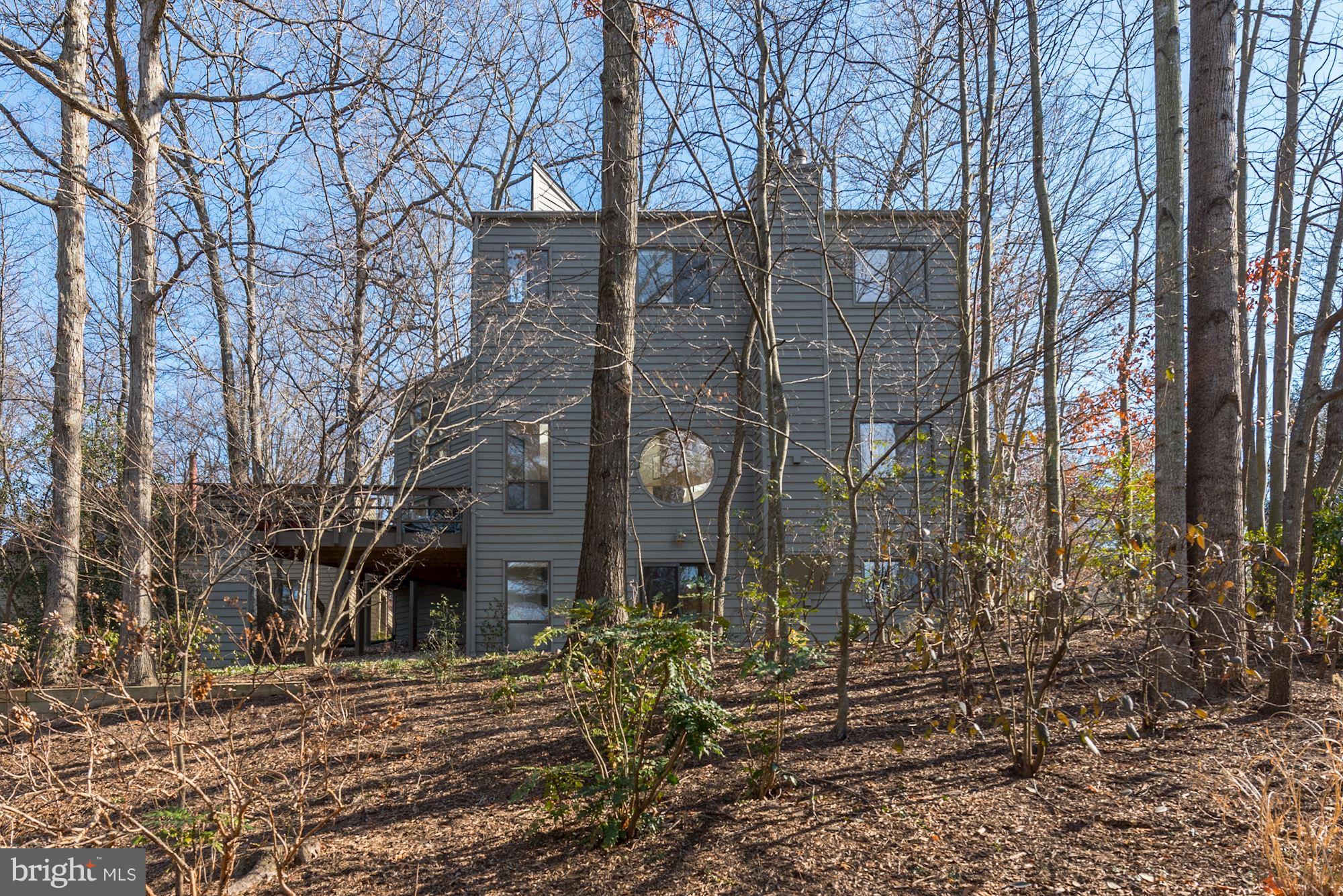 2263 Compass Point Lane Reston, VA 20191 - Photo 26 of 30 Exterior rear of the home and wooded lot