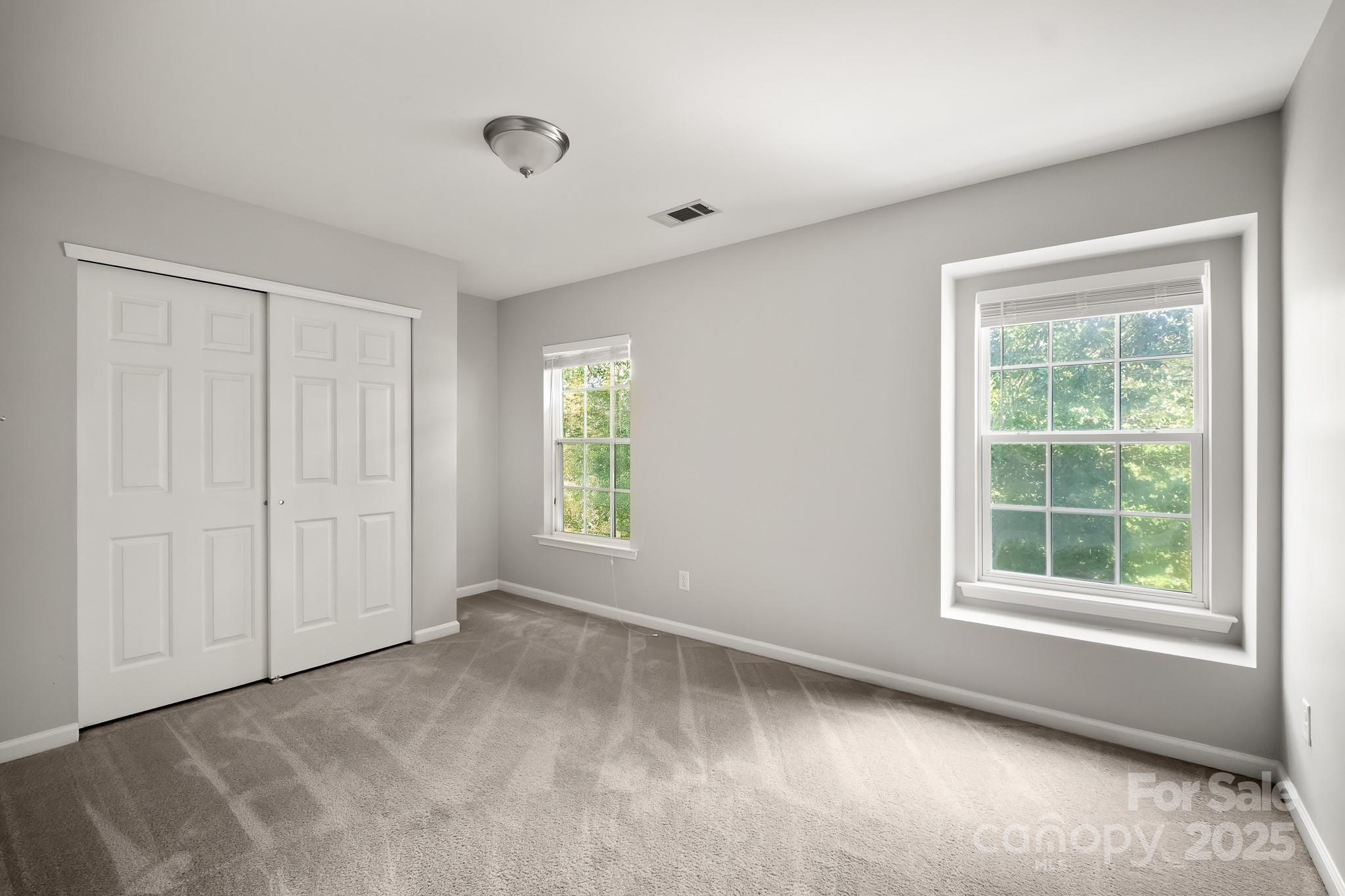 9607 Seamill Road Charlotte, NC 28278 - Photo 14 of 18 a view of an empty room with a window