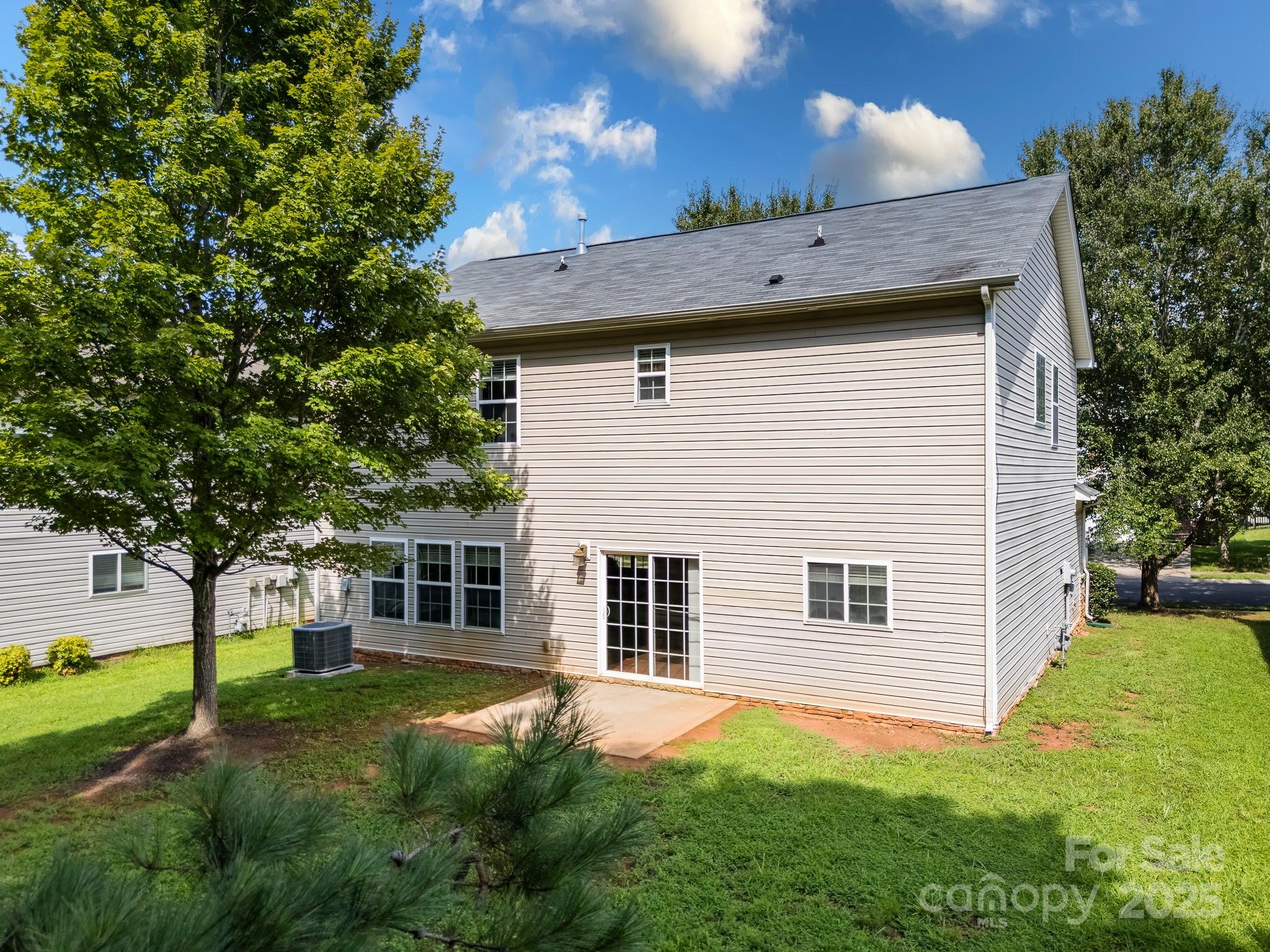 9607 Seamill Road Charlotte, NC 28278 - Photo 17 of 18 a view of a house with a yard
