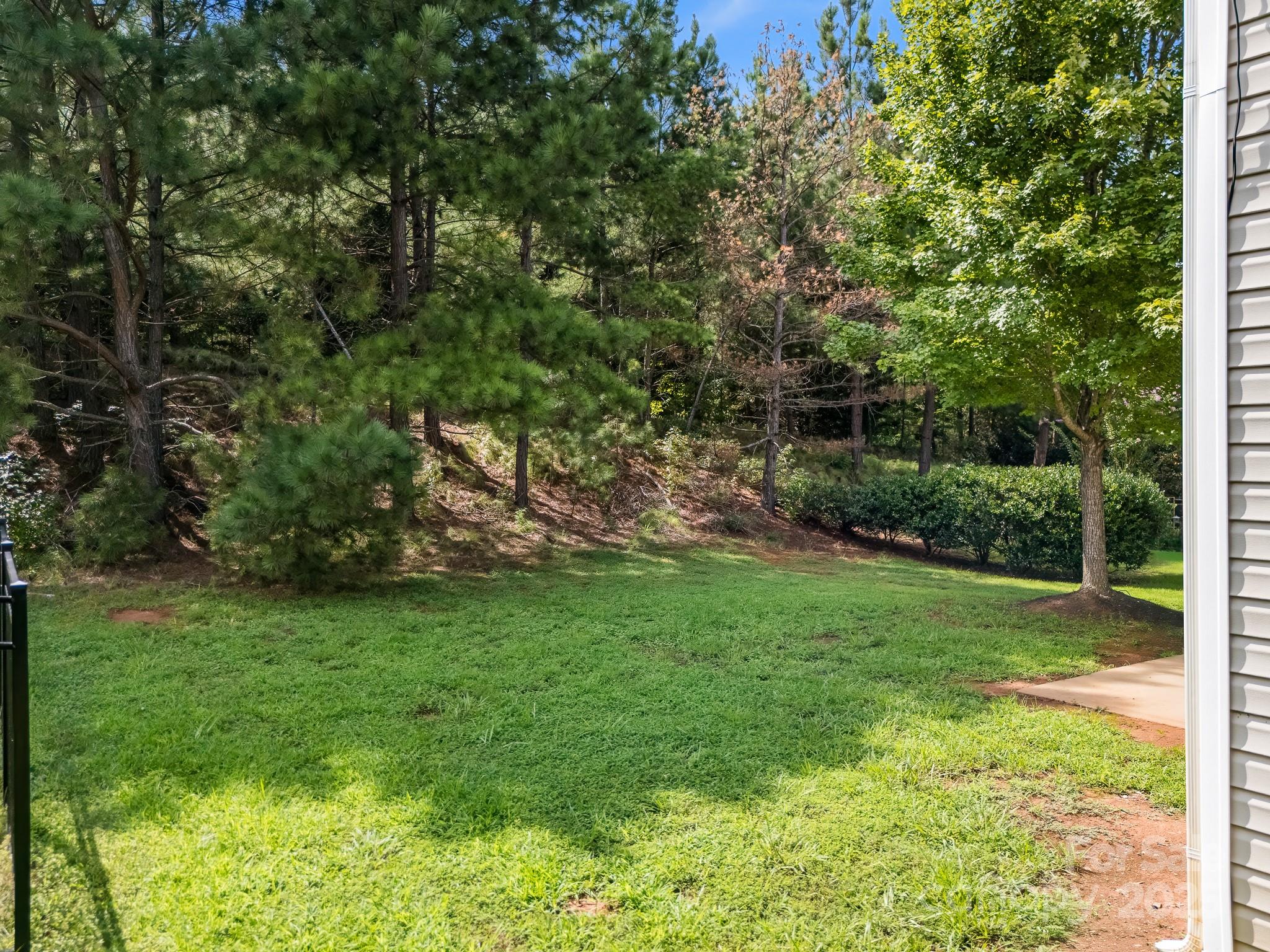 9607 Seamill Road Charlotte, NC 28278 - Photo 18 of 18 a view of a backyard with a garden