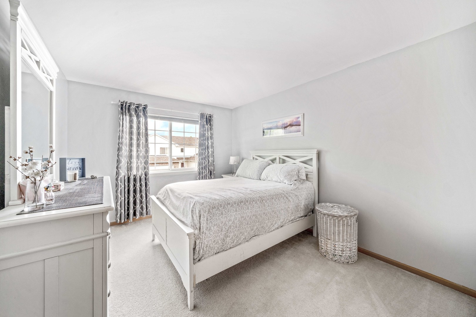 26 Rolling Oaks Road, Unit B Sugar Grove, IL 60554 - Photo 15 of 17 a bedroom with a bed and a sink