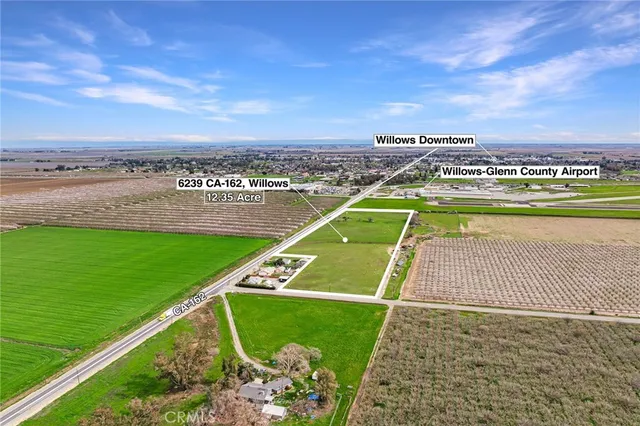 a view of a lake with a big yard
