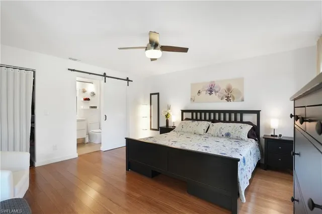 a large white bed in a white room