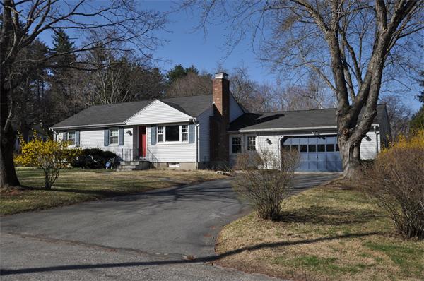 54 Nancy Road Concord, MA 01742 - Photo 16 of 16 a front view of a house with a yard