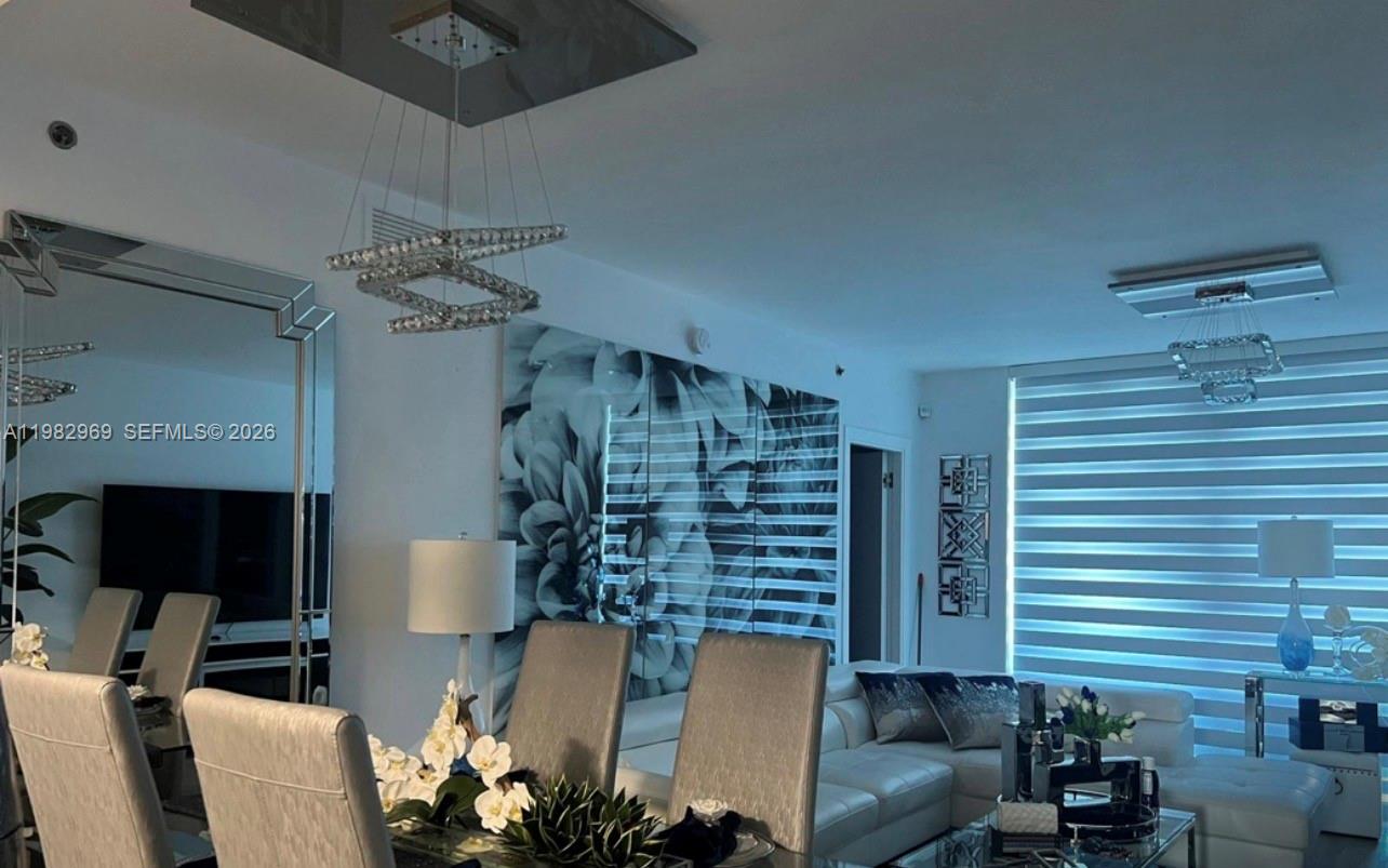 2641 North Flamingo Road, Unit 1505N Sunrise, FL 33323 - Photo 5 of 13 a living room with furniture