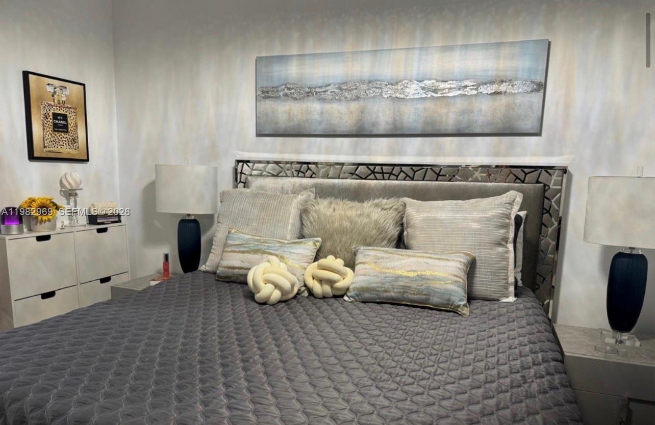 2641 North Flamingo Road, Unit 1505N Sunrise, FL 33323 - Photo 7 of 13 a living room with furniture