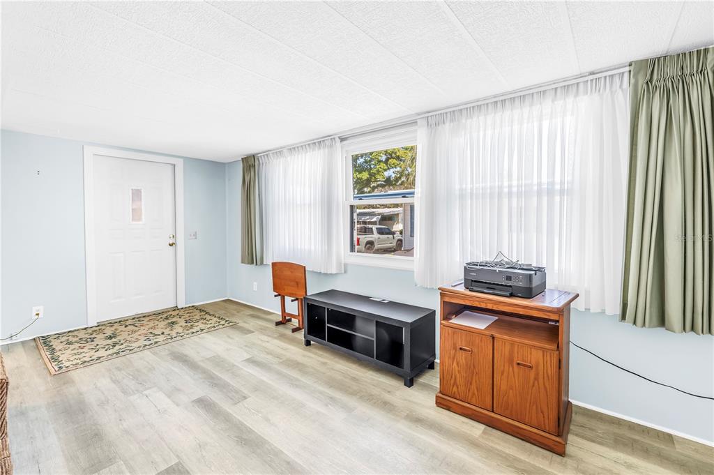 1100 South Belcher Road, Unit 502 Largo, FL 33771 - Photo 13 of 51 a bedroom with a bed and a window