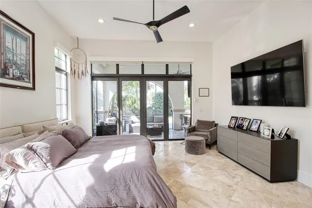 a spacious bathroom with a double vanity sink mirror and bathtub