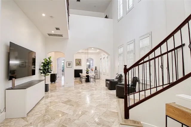a view of living room with furniture and a flat screen tv