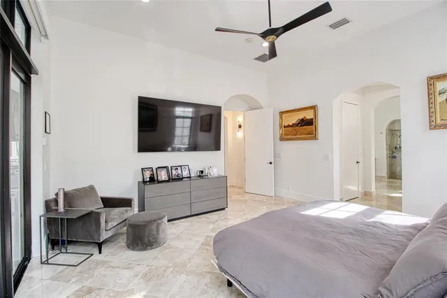a spacious bathroom with double vanity sinks a mirror and a bathtub