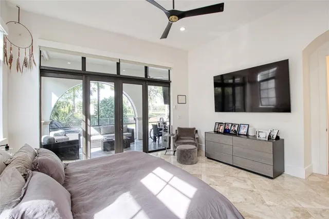 a spacious bathroom with a sink and a mirror