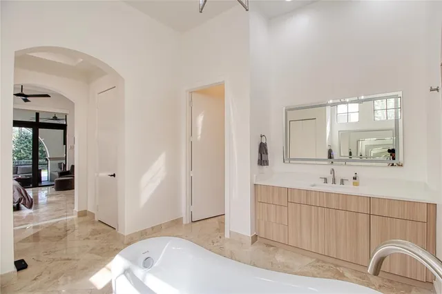 a view of a hallway with windows