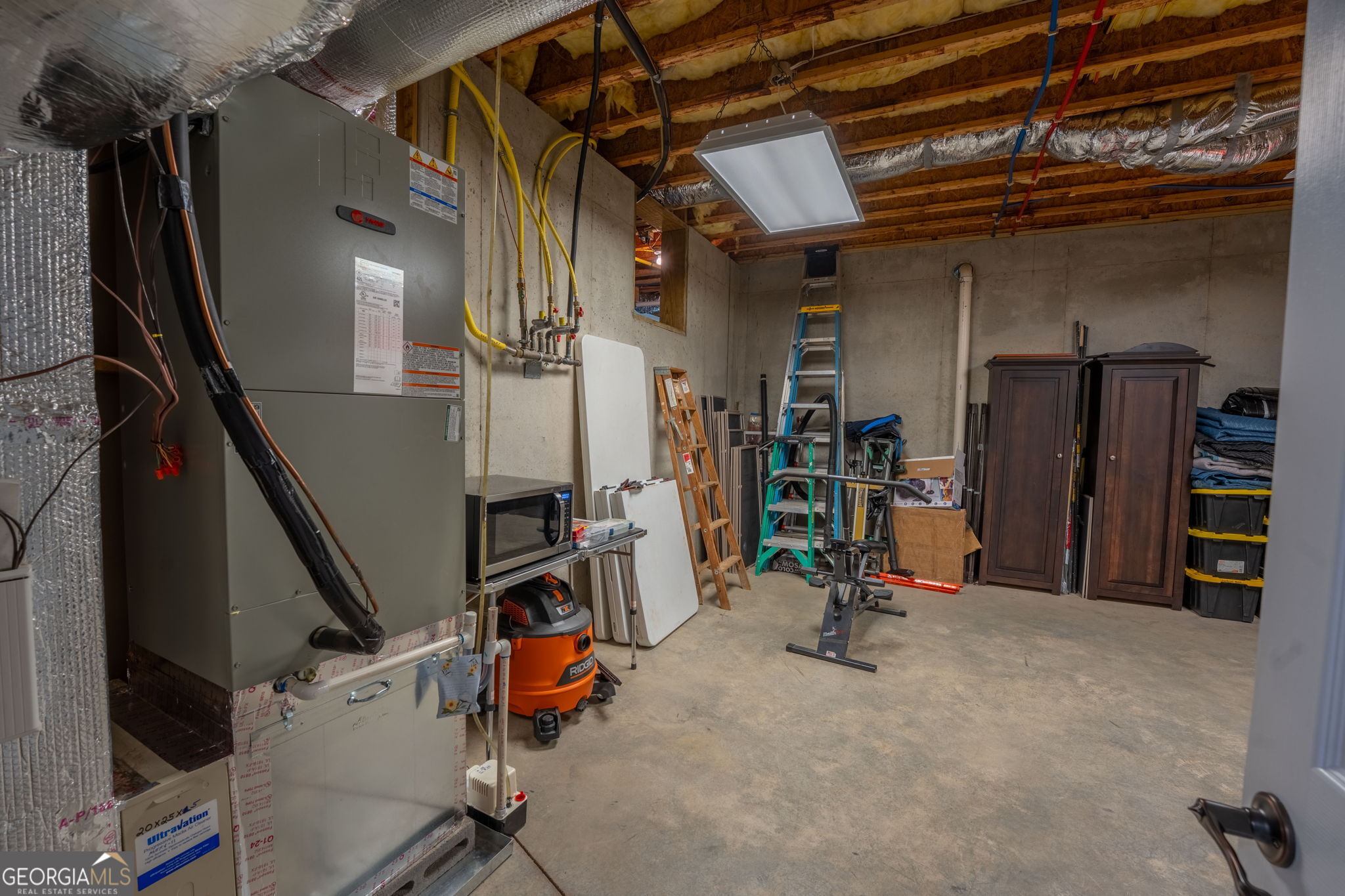 712 Meadow Run Court Clarkesville, GA 30523 - Photo 84 of 96 a view of a room with gym equipment