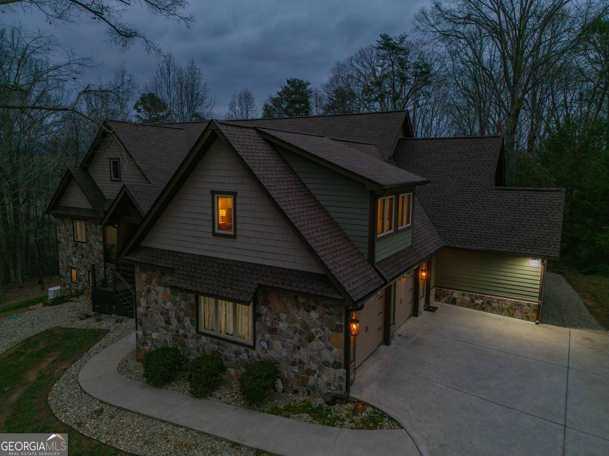 712 Meadow Run Court Clarkesville, GA 30523 - Photo 10 of 96 a front view of a house with garden