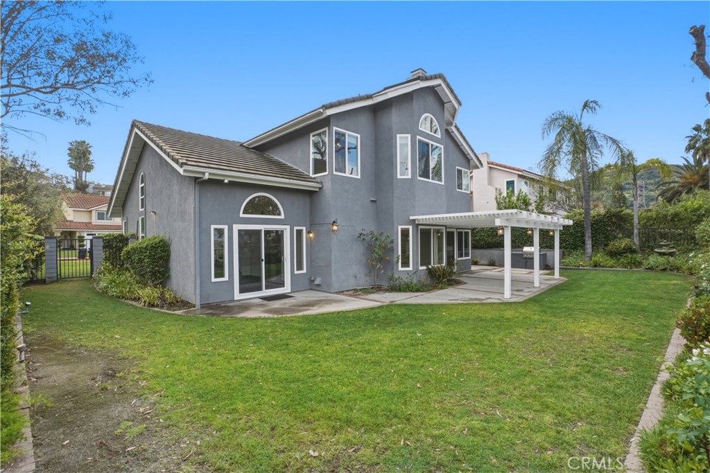 3537 Foxglove Road Glendale, CA 91206 - Photo 14 of 73 a front view of a house with a garden and plants