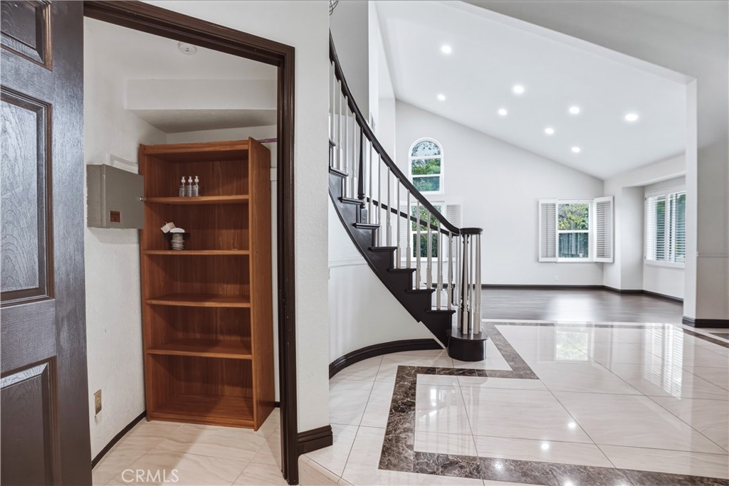 3537 Foxglove Road Glendale, CA 91206 - Photo 22 of 73 a view of entryway and hall with a living room