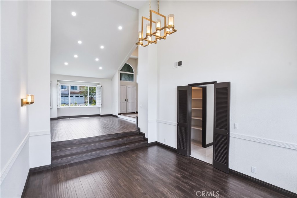 3537 Foxglove Road Glendale, CA 91206 - Photo 27 of 73 wooden floor in an empty room with a window