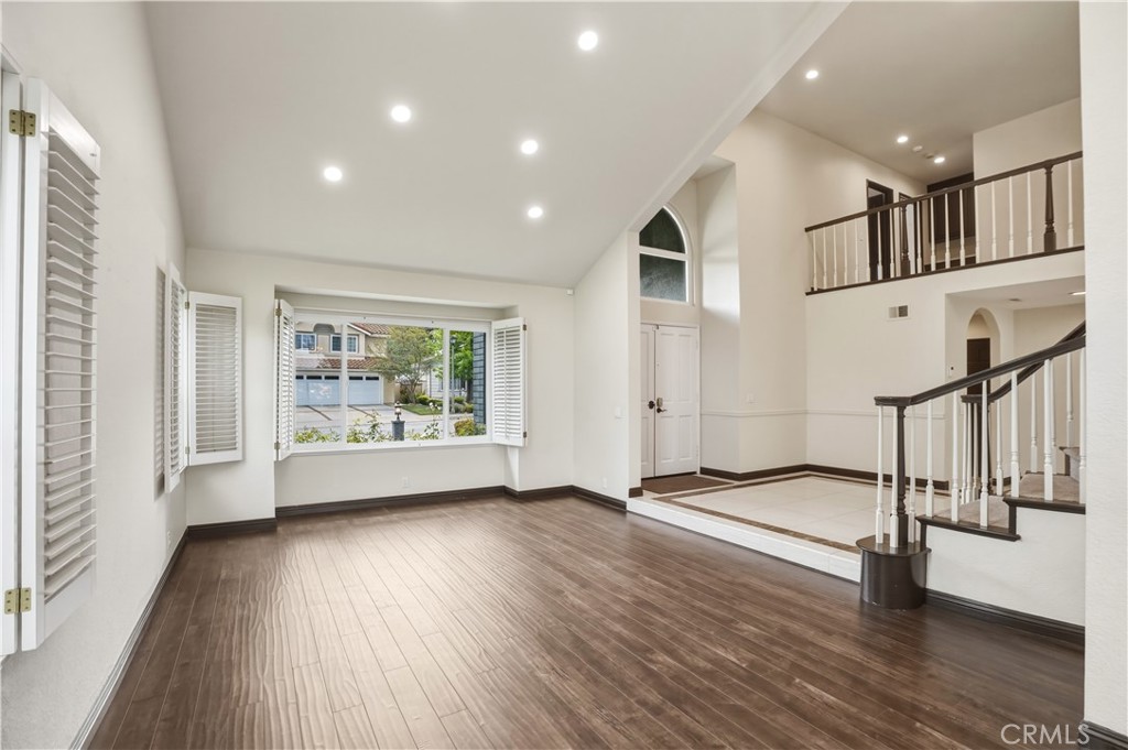 3537 Foxglove Road Glendale, CA 91206 - Photo 28 of 73 a view of an empty room with wooden floor and a window