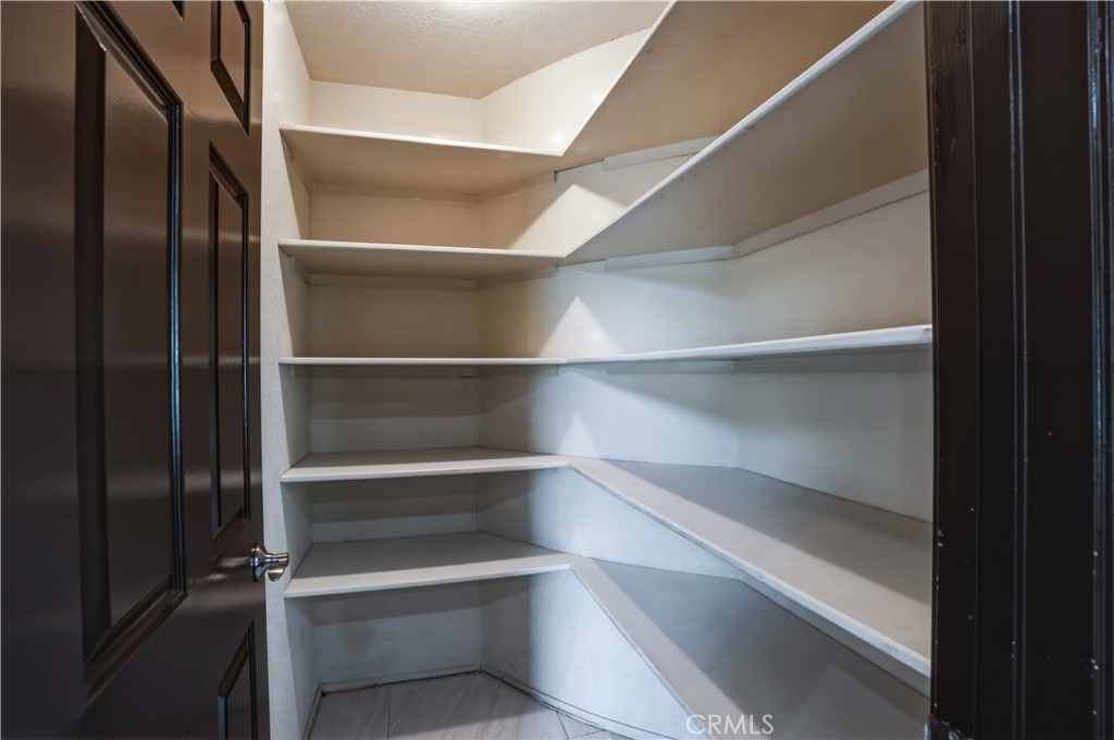 3537 Foxglove Road Glendale, CA 91206 - Photo 37 of 73 a view of walk in closet with empty racks