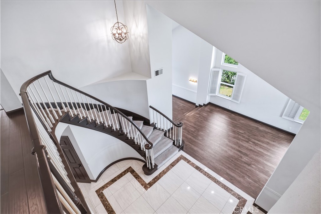 3537 Foxglove Road Glendale, CA 91206 - Photo 55 of 73 a view of entryway with stairs and wooden floor